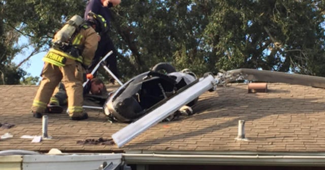 Homemade helicopter crashes into roof CBS News