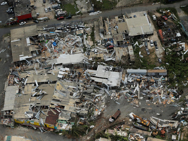 Aluminum roofing is seen twisted and thrown off buildings as recovery efforts continue following Hurricane Maria near San Jose, Puerto Rico 