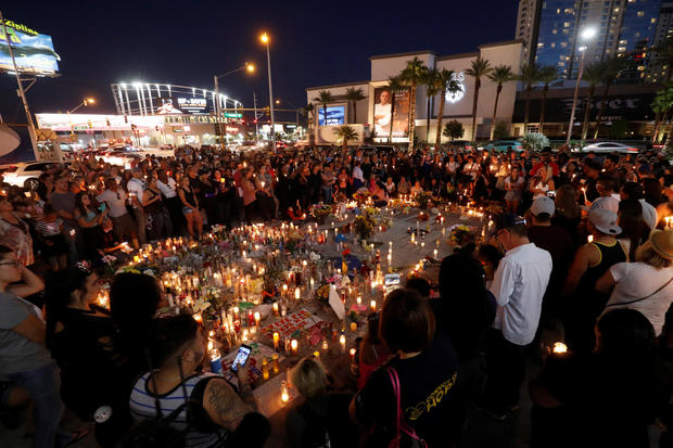 Hundreds of people attend a vigil marking the one-week anniversary of the October 1 mass shooting in Las Vegas 