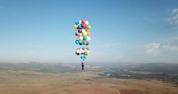 UK adventurer flies over South Africa by party balloons