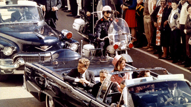 FILE PHOTO: U.S. President John F. Kennedy, First Lady Jaqueline Kennedy and Texas Governor John Connally ride  in a liousine moments before Kennedy was assassinated, in Dallas 