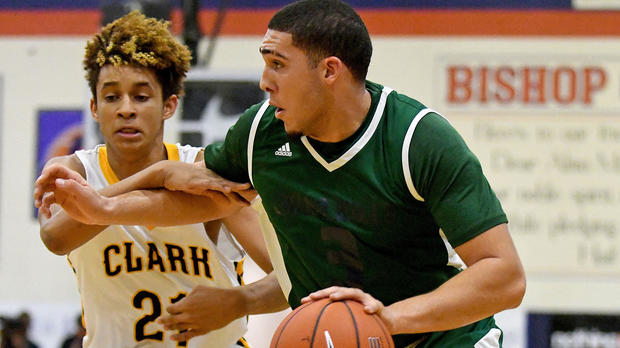 Chino Hills Huskies guard LiAngelo Ball (3) dribbles against the defense of Clark Chargers forward Jalen Hill (21) on the second day of the Tarkanian Classic at Bishop Gorman High School in Las Vegas Dec. 16, 2016. 