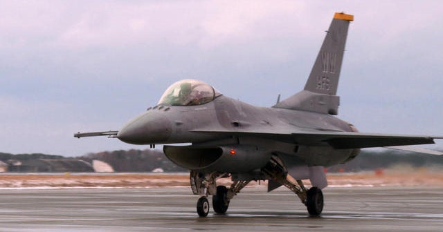 On board a U.S. fighter jet in Japan rehearsing for war