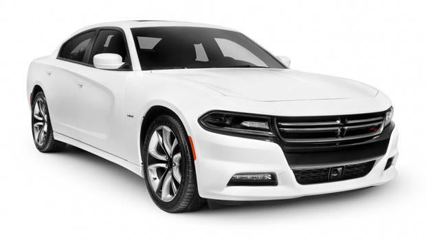 White 2015 Dodge Charger RT Road and Track sports car isolated on white background with clipping path