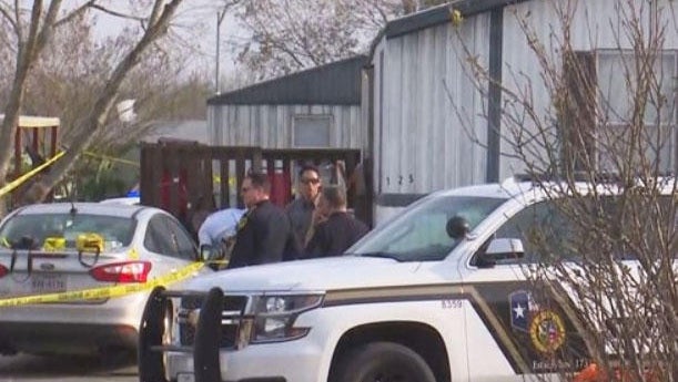 Texas sheriff deputies shoot dead a boy, seven, after opening fire on an unarmed woman who was trying to break into the child's trailer park home
