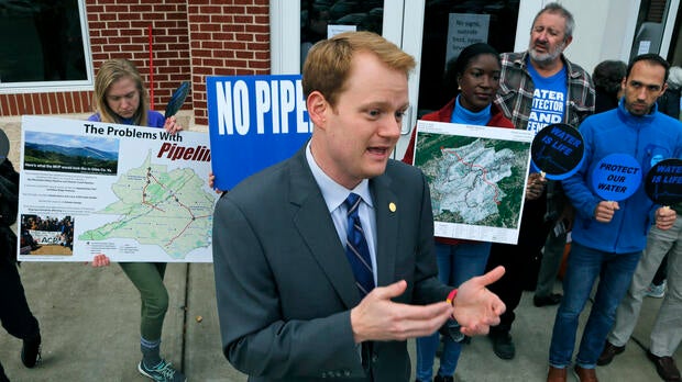Virginia Delegate-elect Chris Hurst, D-Roanoke, speaks during a news conference prior to a meeting of the State Water Control Board in Richmond, Va., Dec. 6, 2017.