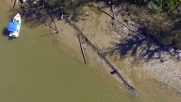 This aerial photo taken Jan. 2, 2018, in Mobile County, Ala., shows the remains of a ship that could be the Clotilda, the last slave ship documented to have delivered captive Africans to the United States. 