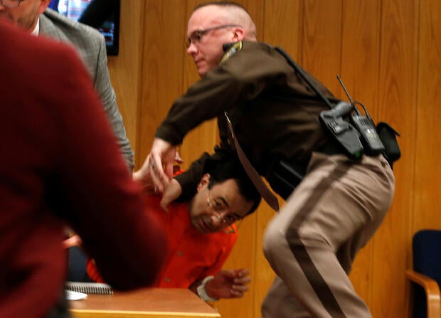 Larry Nassar attacked: Father of victims, Randall ...