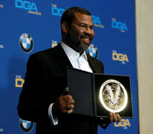 Director Jordan Peele poses with the award for Outstanding Directorial Achievement for First-Time Feature Film for "Get Out," at the 70th Annual DGA Awards in Beverly Hills, California, U.S., February 3, 2018. 
