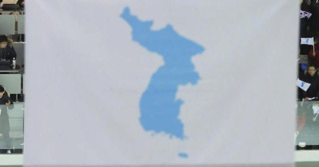 South, North Korea march under unified flag in Olympic opening ceremony