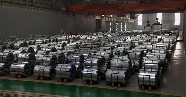 Trump formalizes steel and aluminum tariffs, exempts Canada and Mexico