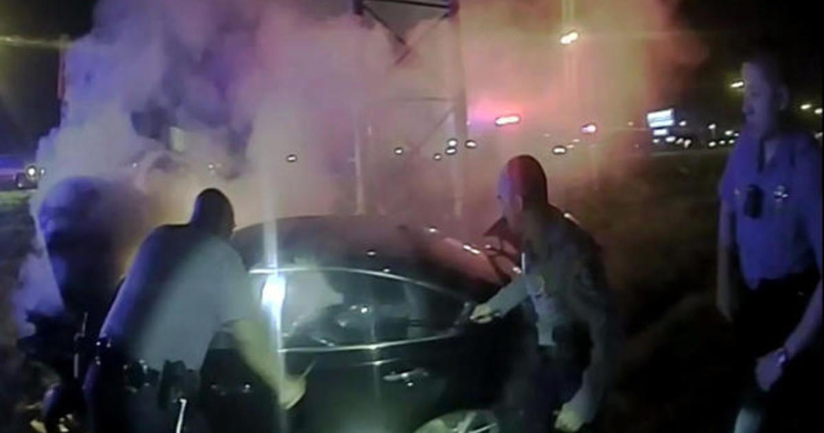 Police Bodycam Video Shows Rescue From Burning Car Cbs News