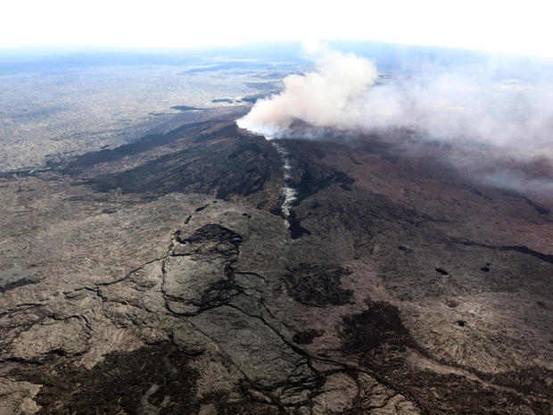 The Kilauea Volcano fissure that formed on the west flank of the Pu'u 'O'o cone after the volcano erupted following a series of earthquakes over the last couple of days in Hawaiiii 
