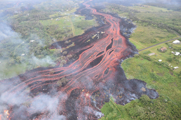 Lava flows downhill in this image from a helicopter overflight in Hawaii 
