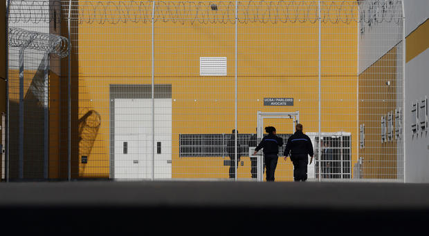   PHOTO: Prison guards enter the prison of Reau 