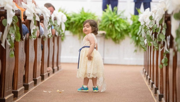 Toddler cancer survivor serves as flower girl to bone marrow donor