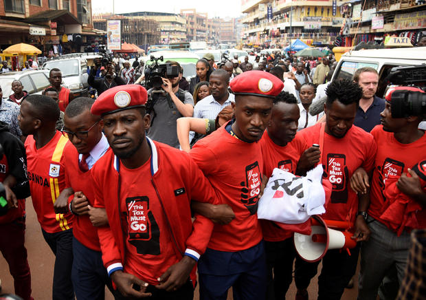 Ugandan musician turned politician, Robert Kyagulanyi, leads activists during a demonstration against new taxes including a levy on access to social media platforms in Kampala 
