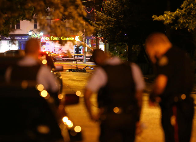 A bomb disposal robot is seen deployed within the police cordon near the scene of a mass shooting in Toronto 