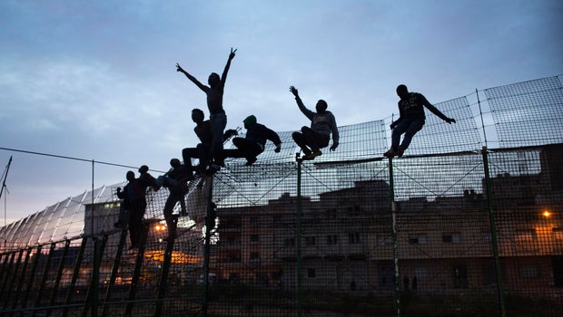 Migrants storm Ceuta border crossing into Spain as Europe ...