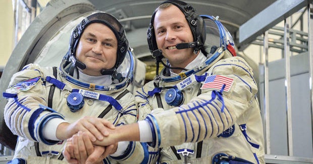 Image result for Rescued Russian and US astronauts after the devastation of the space shuttle Soyuz