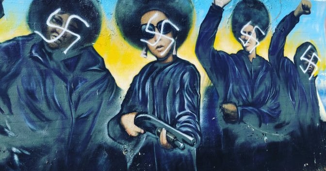 LAPD Probes Swastikas Painted On Mural Depicting Black Panther Members