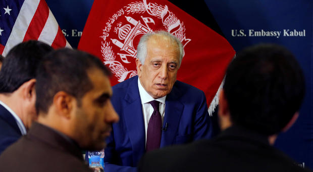 U.S. special envoy for peace in Afghanistan, Zalmay Khalilzad, talks with local reporters at the U.S. embassy in Kabul 
