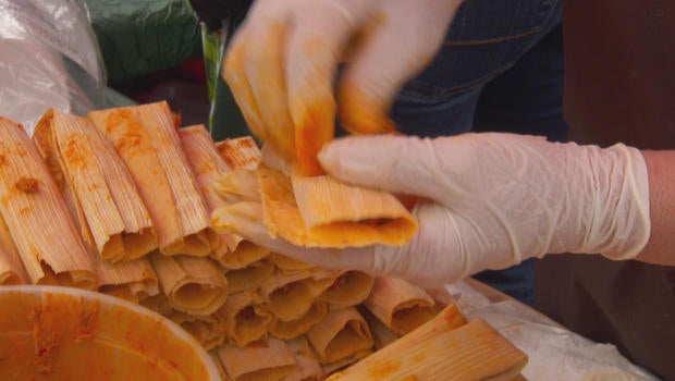 One family's Christmastime tradition A tamalewrapping party CBS News