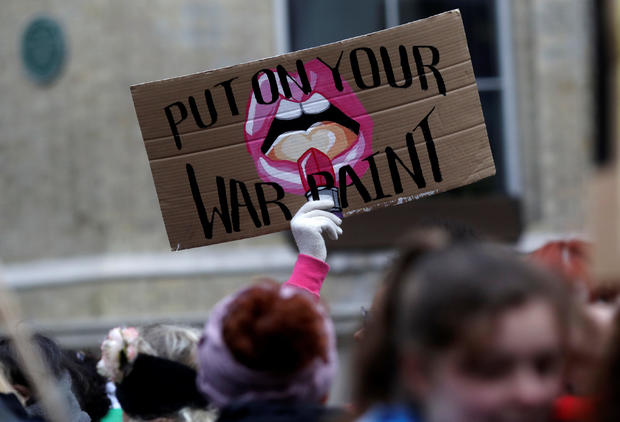 Protesters take part in the Women's March calling for equality, justice and an end to austerity in London 