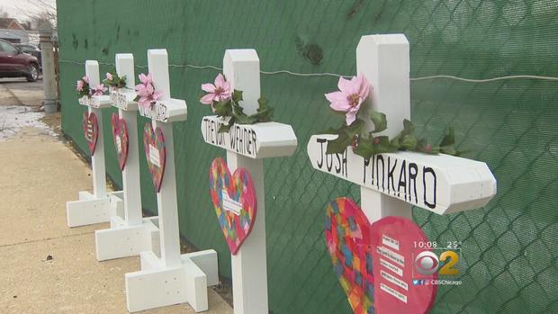 Aurora Man Places White Crosses For Victims Of Henry Pratt Company Shooting 