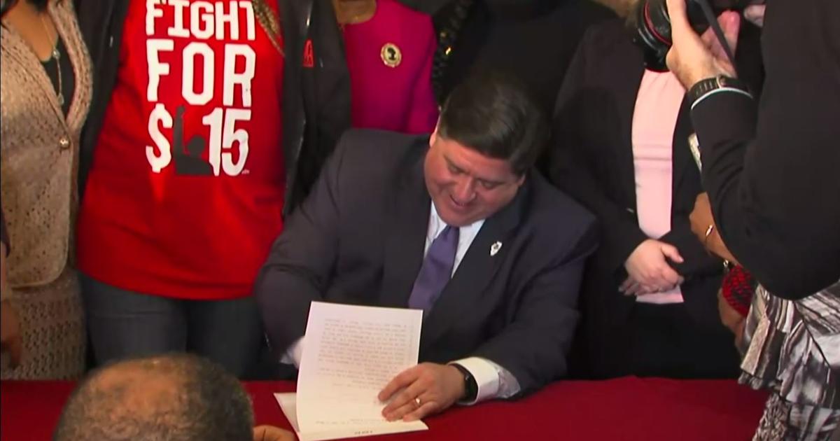 Pritzker Signs Law Raising Illinois Minimum Wage To 15 An Hour By 2025