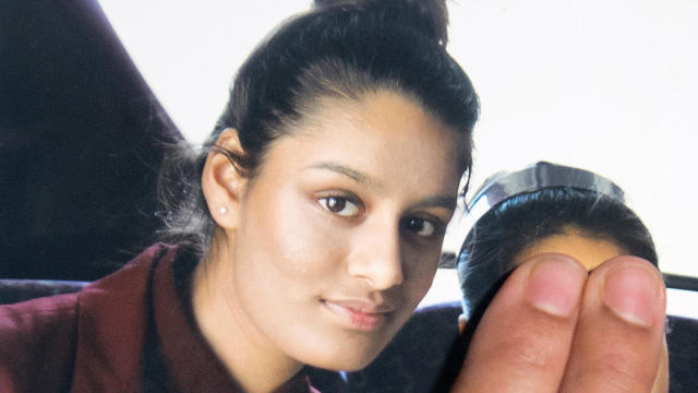Shamima Begum is seen in a photo held by her sister Renu Begum at Scotland Yard in London Feb. 22, 2015. 