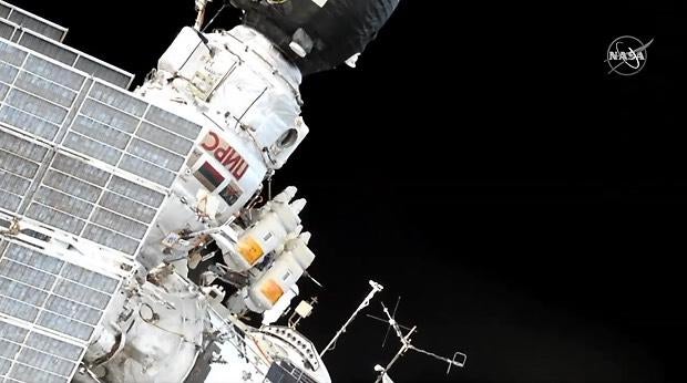 Cosmonauts Oleg Kononenko and Alexey Ovchinin sported orange placards on their spacesuit backpacks that wished a happy 85th birthday to retired cosmonaut Alexey Leonov, the first man to walk in space in 1965, outside the International Space Station on May 29, 2019.