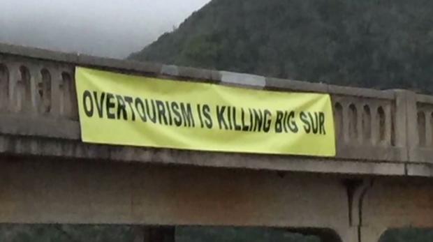 "Overtourism Is Killing Big Sur" Banner Bixby Bridge 