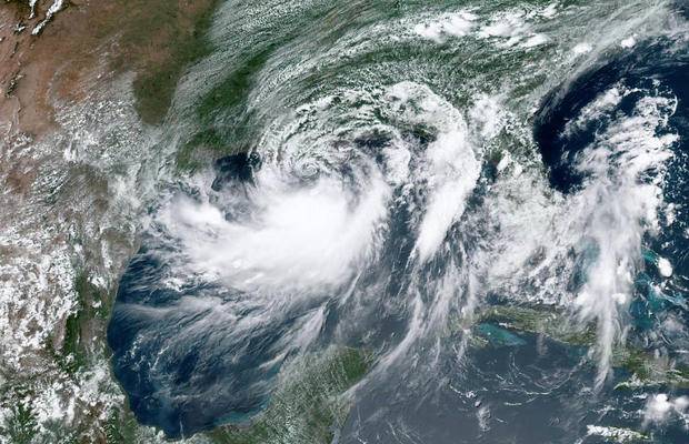 Tropical Storm Barry approaches the coast of Louisiana from the Gulf of Mexico in this satellite handout photo July 12, 2019. 
