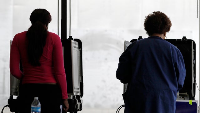 Georgia voters are seen at a voting machine at the Athens-Clarke County Fleet building in Athens, Georgia, on Nov. 8, 2016. 