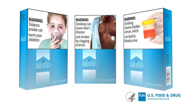 Handout photo of an rtist's rendition of the U.S. Food and Drug Administration's (FDA) proposed cigarette packaging carrying graphic new health warnings