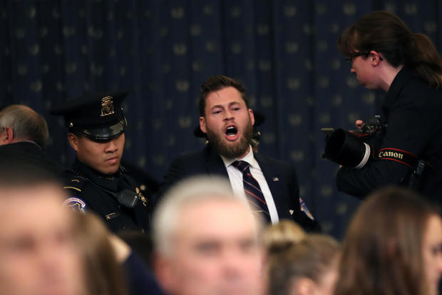 Infowars host interrupts start of House impeachment hearing Gettyimages-1187379323