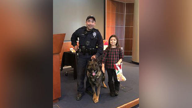 8-Year-Old Girl Gifts Holiday Stockings Full Of Treats  To Dallas K9 Officers 