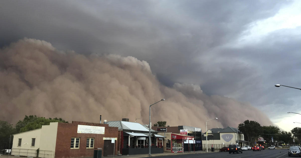 Australia dust storms, hail and flash floods damage homes, cut power