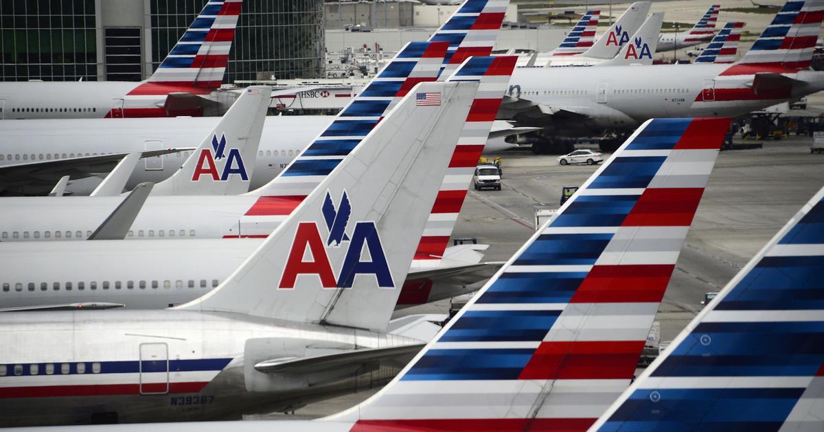 Pilot union sues American Airlines to stop service to China - CBS News
