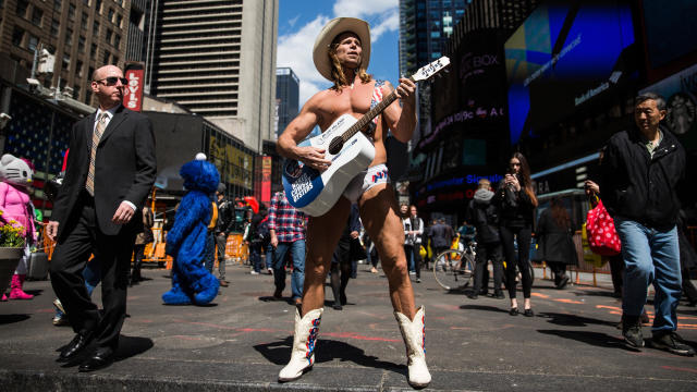 The Naked Cowboy plays guitar in Times Square on April 9, 2014, in New York City. 