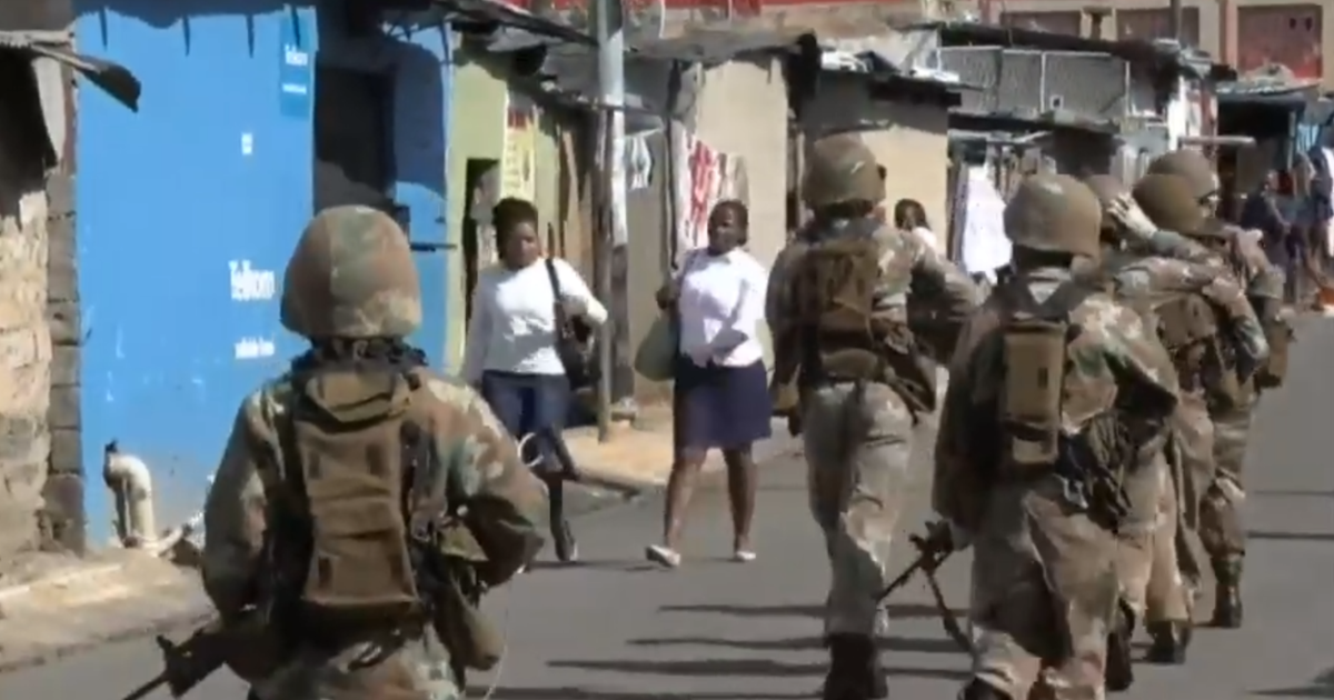 South Africa security forces fire rubber bullets at people defying