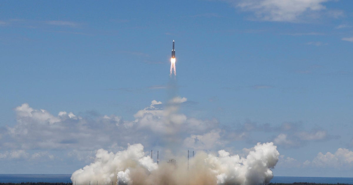China launches spacecraft it hopes to land on Mars - CBS News