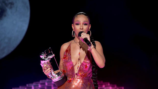 Doja Cat accepts the award for Best New Artist during the 2020 MTV VMAs 
