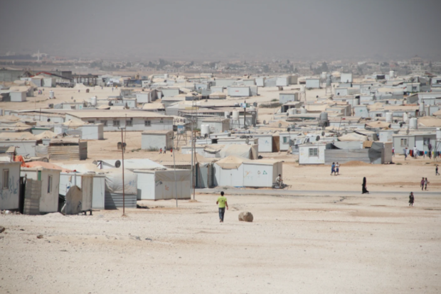 COVID creeps into a sprawling Syrian refugee camp in Jordan - CBS News