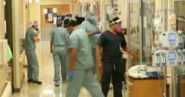 COVID19 cases in U.S. surge to another record high CBS News