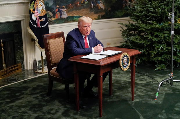 U.S. President Donald Trump speaks to reporters after participating in a Thanksgiving video teleconference with members of the military forces at the White House in Washington 