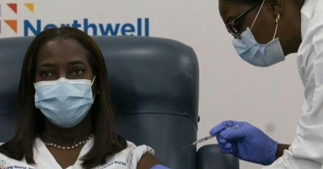 Healing is coming: U.S. health workers start getting vaccine