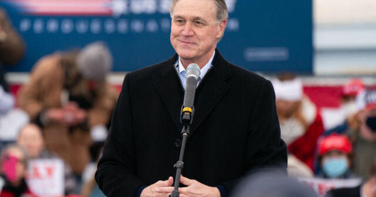 David Perdue To Quarantine After Coming In Contact With Someone With Covid 19 Cbs News