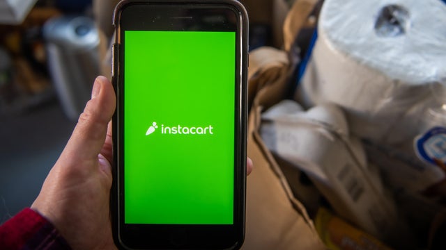 Instacart logo with groceries 